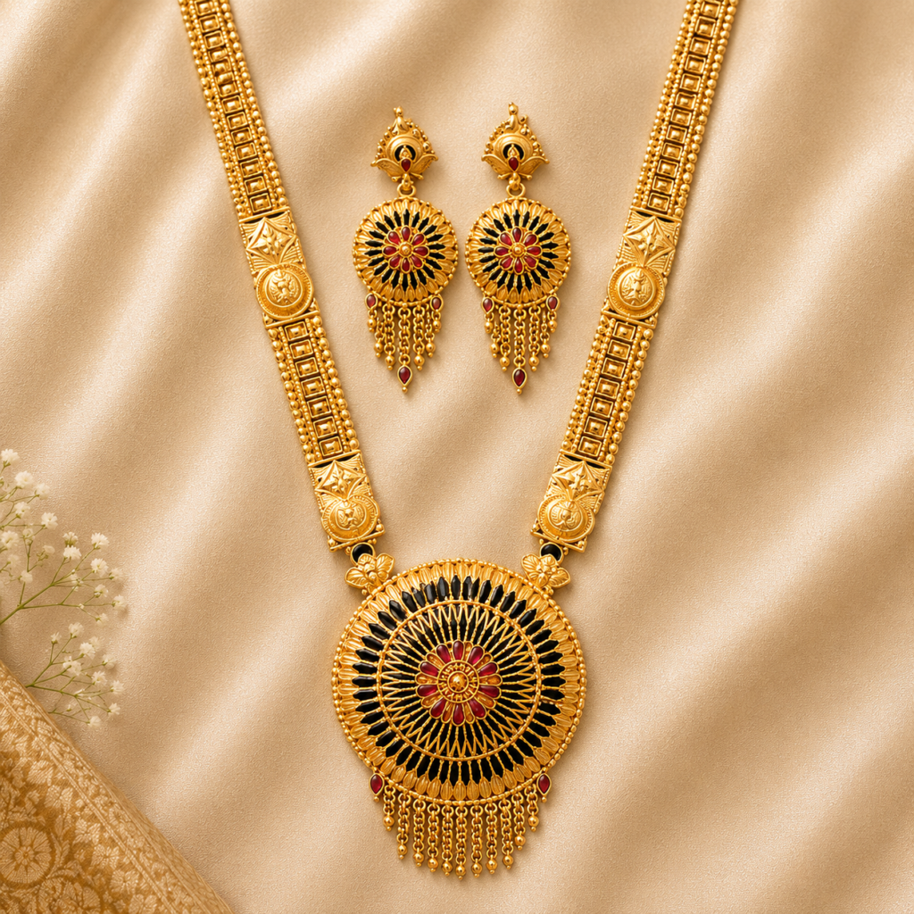 Antique gold plated rani har long necklace set with round sunburst pendant, red meenakari detailing and matching tassel drop earrings