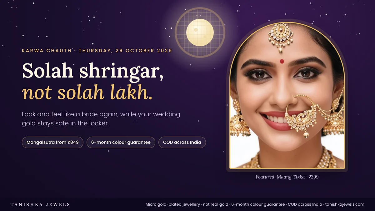 Bride in solah shringar with a gold-plated maang tikka under the Karwa Chauth moon